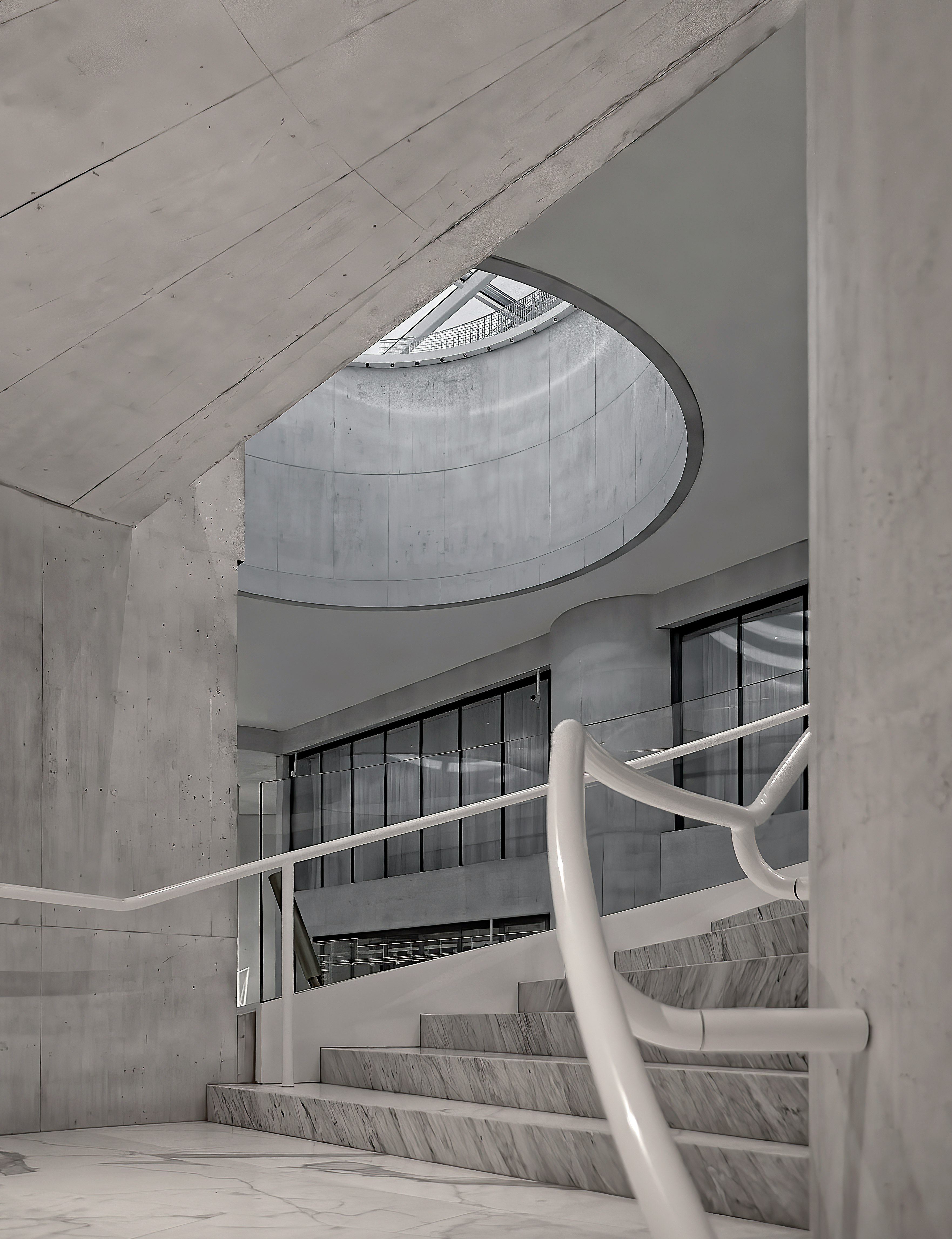 white staircase near blue and white concrete building